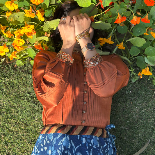 Burnt orange cotton satin pleated top