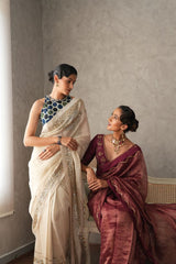 Burgundy striped tissue saree with sequinned waves embroidery - Sohni