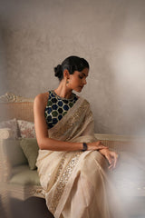 Ivory tissue saree with sequinned borders - Sohni