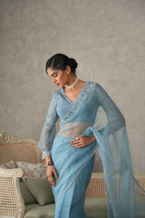 Sky blue organza saree with pearls embroidery cutwork border - Sohni