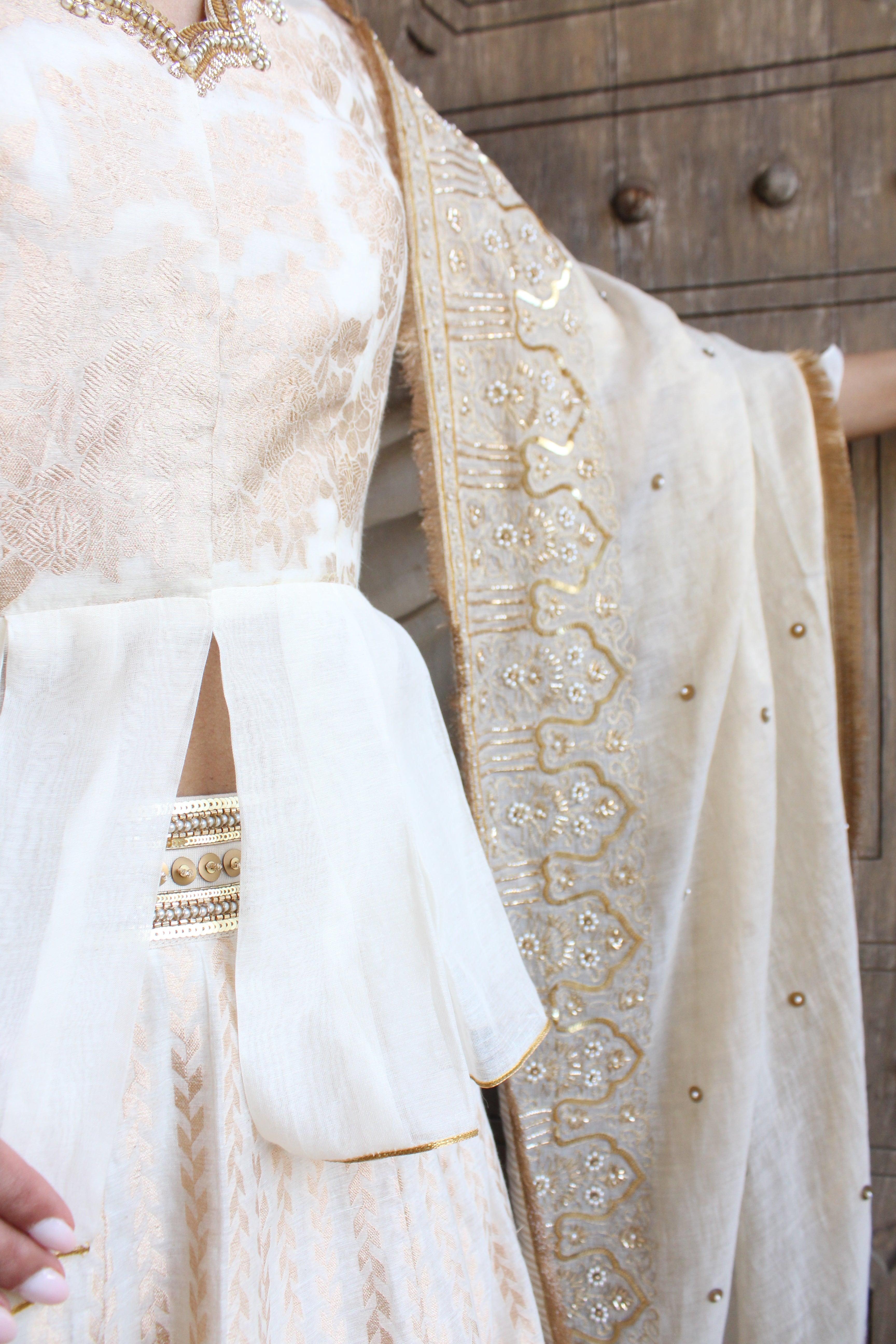 Kafoori ivory Banarasi cotton silk lehenga with peplum blouse and tissue chanderi embroidered dupatta - Sohni