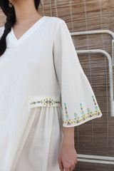 Ivory crinkle cotton midi dress with geometric folk embroidery - Sohni