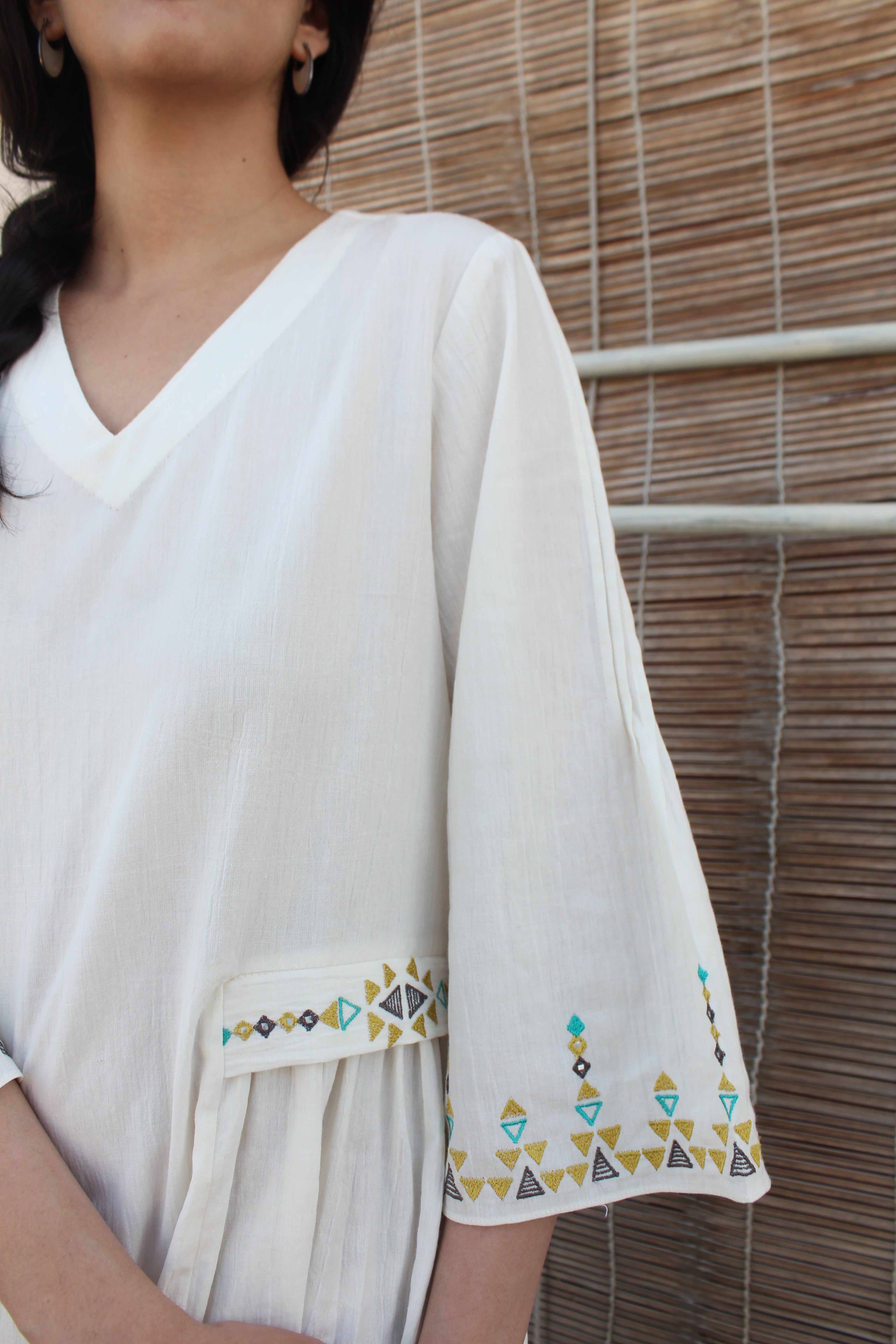 Ivory crinkle cotton midi dress with geometric folk embroidery - Sohni