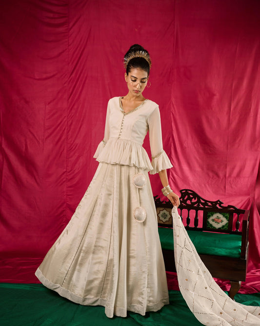 Ivory tissue lehenga with peplum blouse and mukaish organza dupatta - Sohni