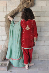 Red short kurta and salwar velvet set with green silk dupatta