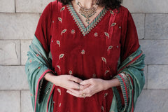 Red short kurta and salwar velvet set with green silk dupatta