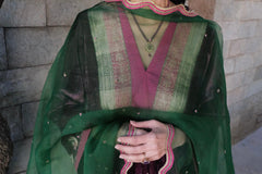 Berry velvet gathered kurta with banarsi border detail, silk pants and contrast green organza dupatta