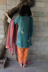 Eggshell blue short kurta with neon peach banarsi booti salwar and pink tissue dupatta