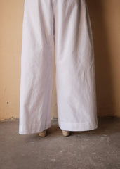 White Handloom Cotton Flared Pants with Floral Dori Embroidery Godet