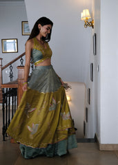 Eggshell blue and mehndi tissue chanderi layered lehenga, halter blouse and striped tissue chanderi dupatta