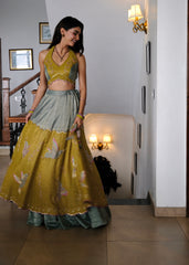 Eggshell blue and mehndi tissue chanderi layered lehenga, halter blouse and striped tissue chanderi dupatta