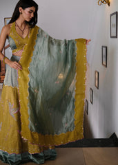 Eggshell blue and mehndi tissue chanderi layered lehenga, halter blouse and striped tissue chanderi dupatta