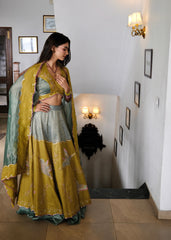 Eggshell blue and mehndi tissue chanderi layered lehenga, halter blouse and striped tissue chanderi dupatta