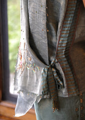 Eggshell striped tissue chanderi asymmetrical wrap top and tapered pants with monkey motif embroidery