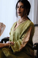 Sap green striped tissue chanderi kurta set with peach gold booti organza dupatta and exotic birds embroidery
