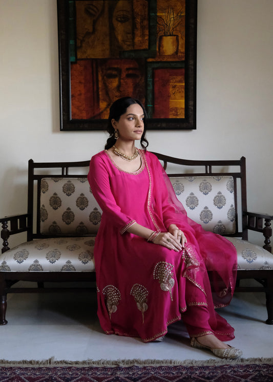 Rani pink georgette anarkali with peacock motif