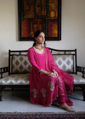 Rani pink georgette anarkali with peacock motif