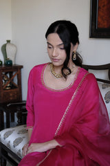 Rani pink georgette anarkali with peacock motif