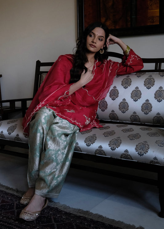 Red chanderi short kurta and mint green banarsi jaal salwar with scalloped dupatta