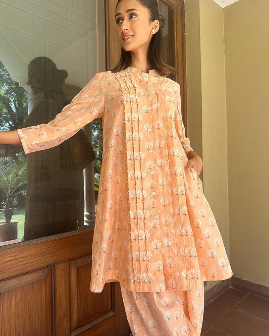 Peach orange co ord set with smocking and pearl detail