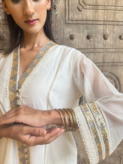 Ivory chanderi overlap kurta set with sequinned embroidery and schiffli detail