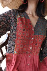 Madder red organic mulmul peplum top with Kalamkari borders