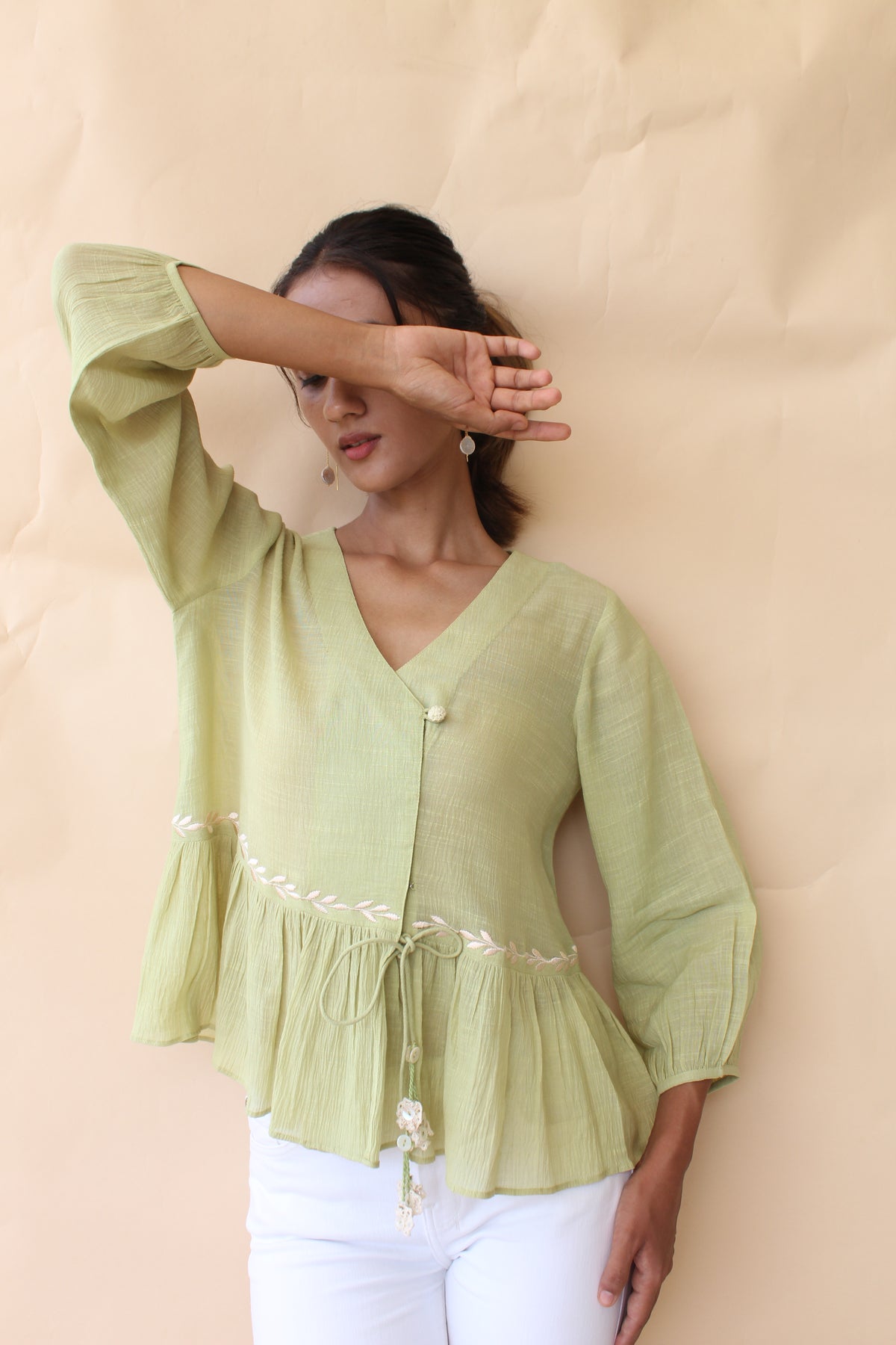 Tea green crinkle cotton crossover peplum top