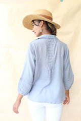 Periwinkle blue crinkle cotton top with twisted pleats