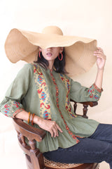 Green organic mulmul peplum top with Kalamkari borders