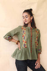 Green organic mulmul peplum top with Kalamkari borders