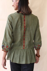 Green organic mulmul peplum top with Kalamkari borders