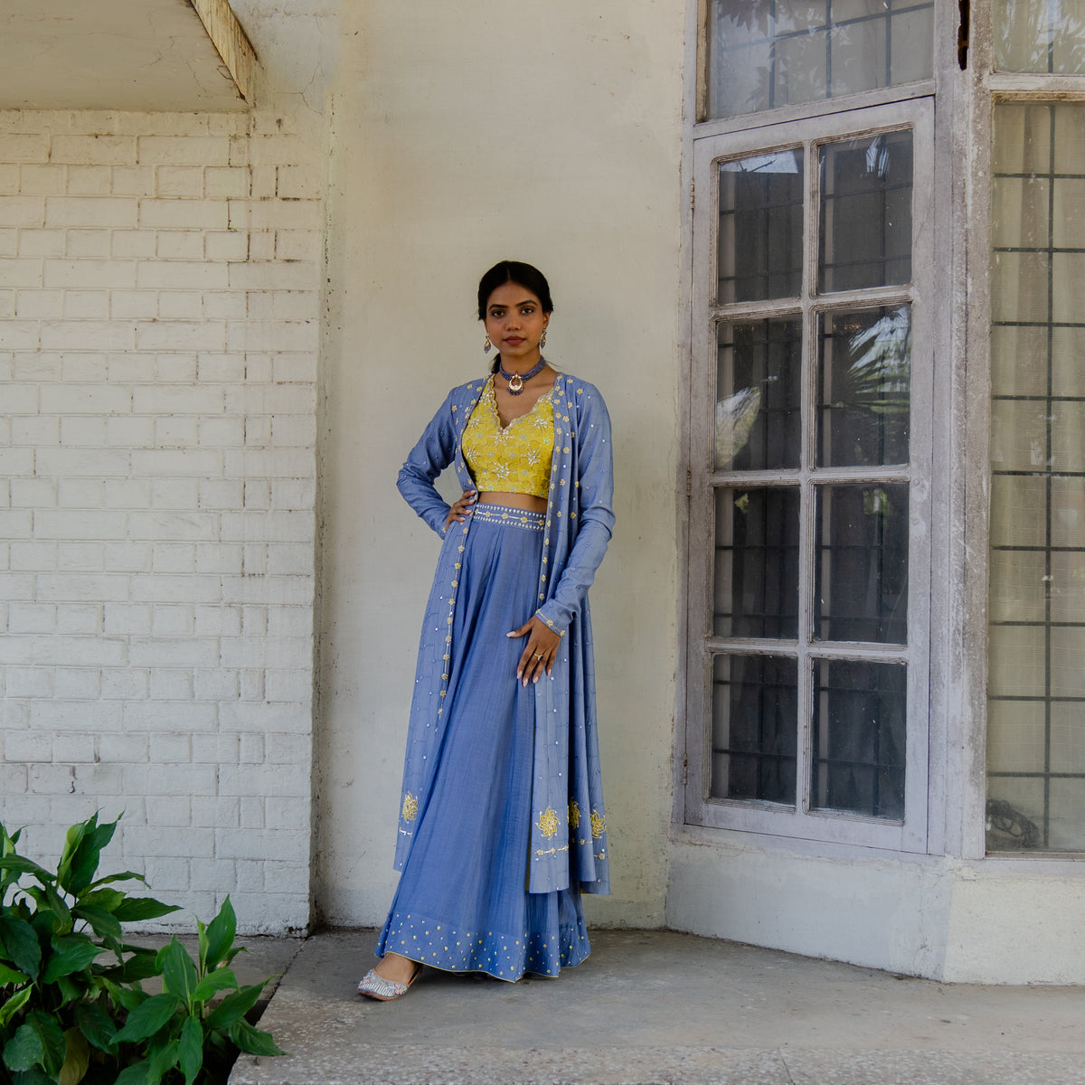 Lavender blue chanderi mirror work cape with chartreuse embroidered blouse and sharara pants