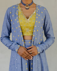 Lavender blue chanderi mirror work cape with chartreuse embroidered blouse and sharara pants