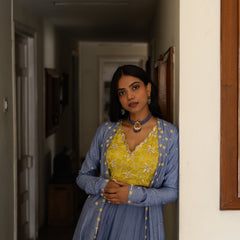 Lavender blue chanderi mirror work cape with chartreuse embroidered blouse and sharara pants