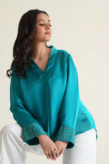 Peacock blue modal silk long sleeved top with embroidered cuffs