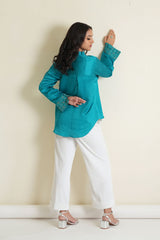 Peacock blue modal silk long sleeved top with embroidered cuffs