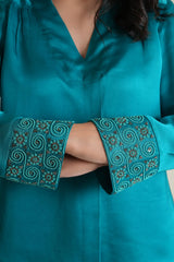 Peacock blue modal silk long sleeved top with embroidered cuffs