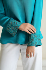 Peacock blue modal silk long sleeved top with embroidered cuffs