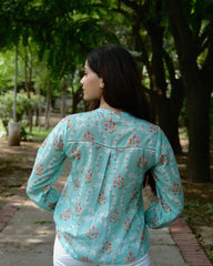Aqua blue floral print mulmul top with schiffli lace - Sohni