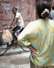 Aqua green and mustard lotus print pleated muslin blouse - Sohni