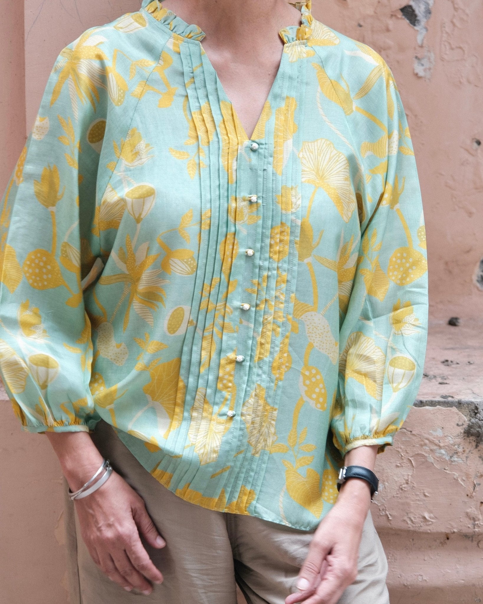 Aqua green and mustard lotus print pleated muslin blouse - Sohni