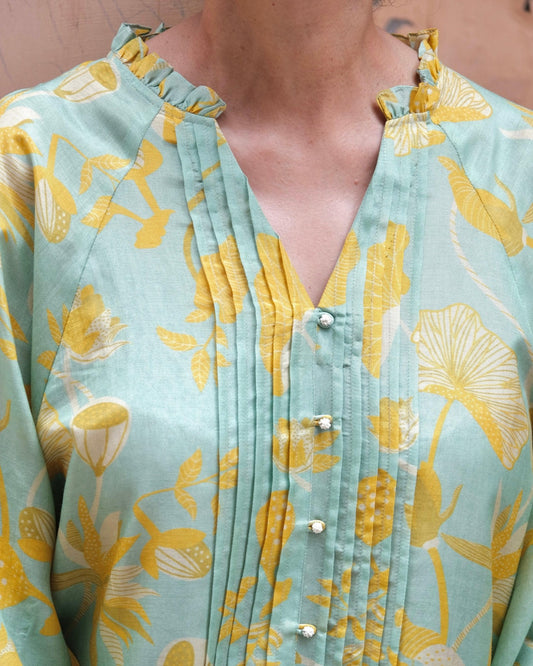 Aqua green and mustard lotus print pleated muslin blouse - Sohni