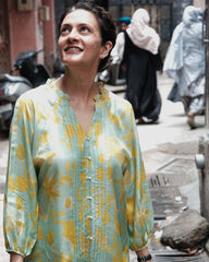 Aqua green and mustard lotus print pleated muslin blouse - Sohni