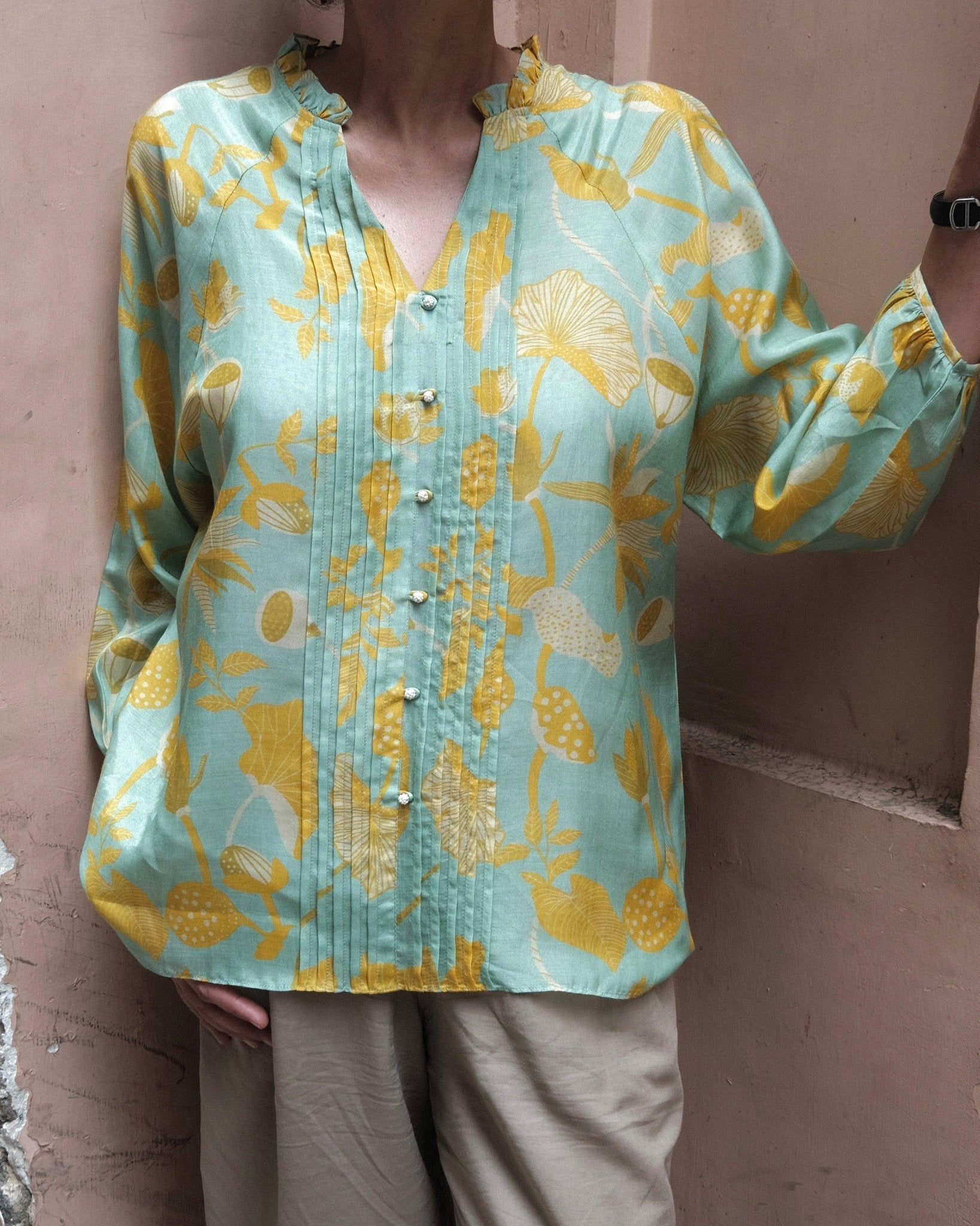 Aqua green and mustard lotus print pleated muslin blouse - Sohni