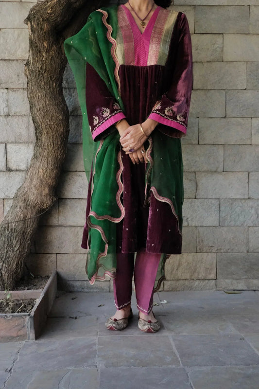 Berry velvet gathered kurta with banarsi border detail, silk pants and contrast green organza dupatta - Sohni
