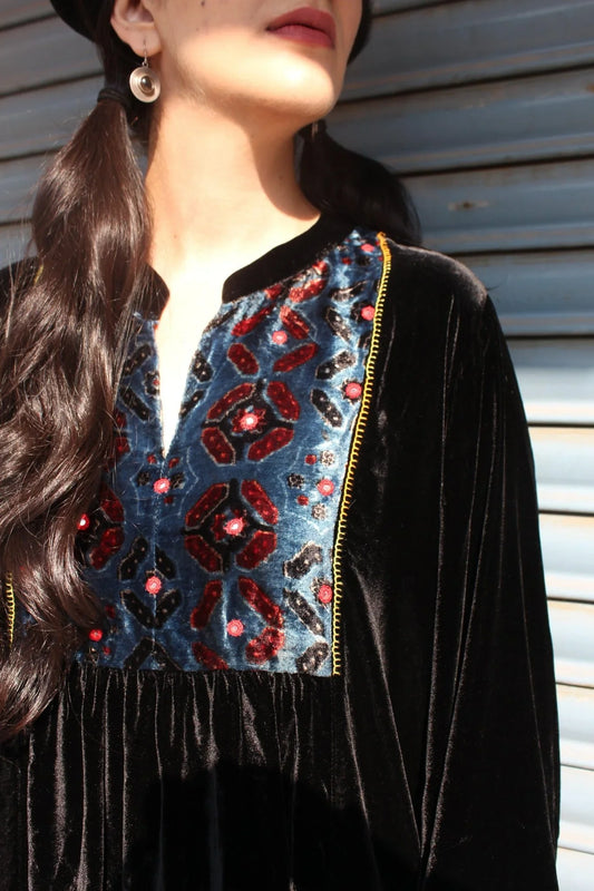Black velvet tunic top with ajrakh print yoke and flared long sleeves - Sohni
