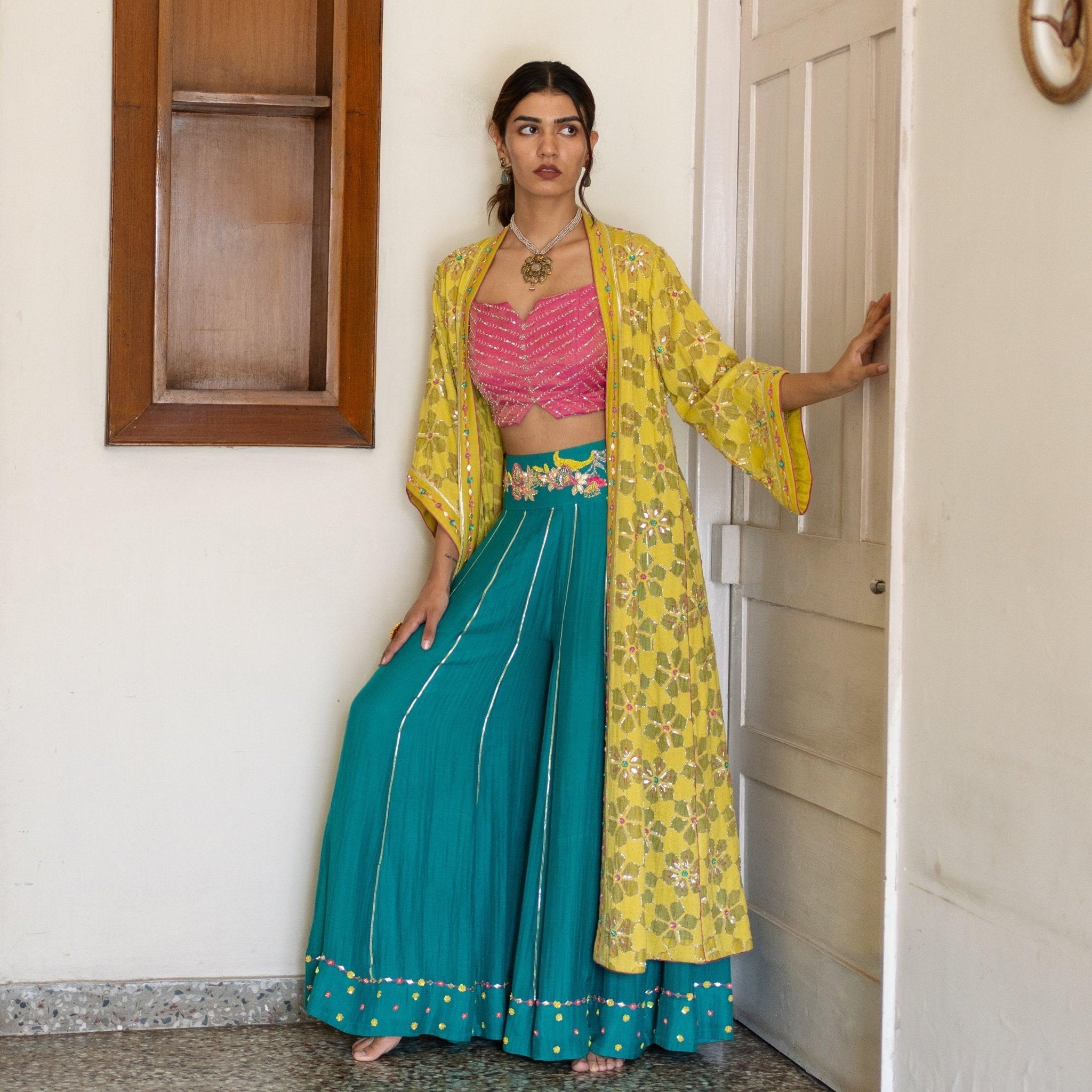 Chartreuse chanderi embroidered cape with mithai pink bustier and peacock sharara pants - Sohni