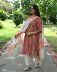Coral pink boota jaal muslin honeycomb smocked kurta, dobby salwar and lehriya dupatta - Sohni