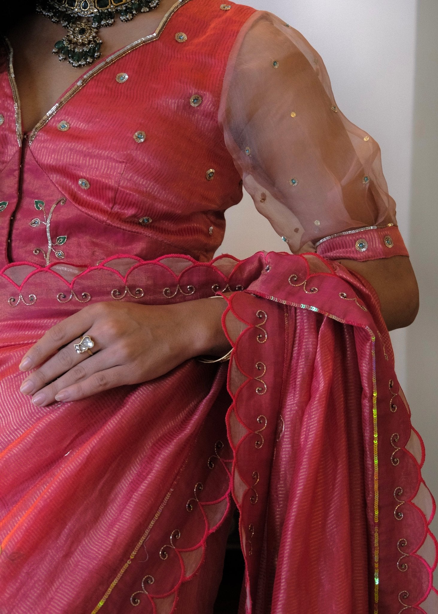 Coral pink striped tissue chanderi saree with birds of paradise embroidery - Sohni