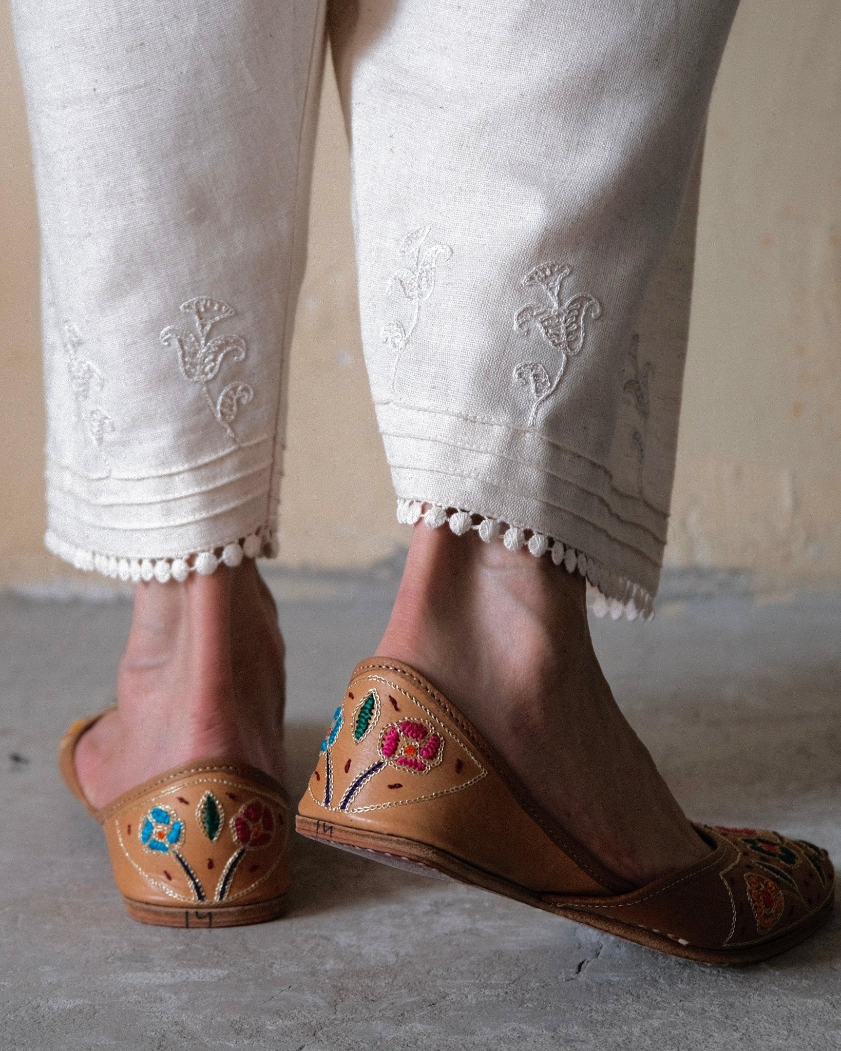 Cream (greige) slub cotton salwar with dori booti embroidery and lace edging - Sohni